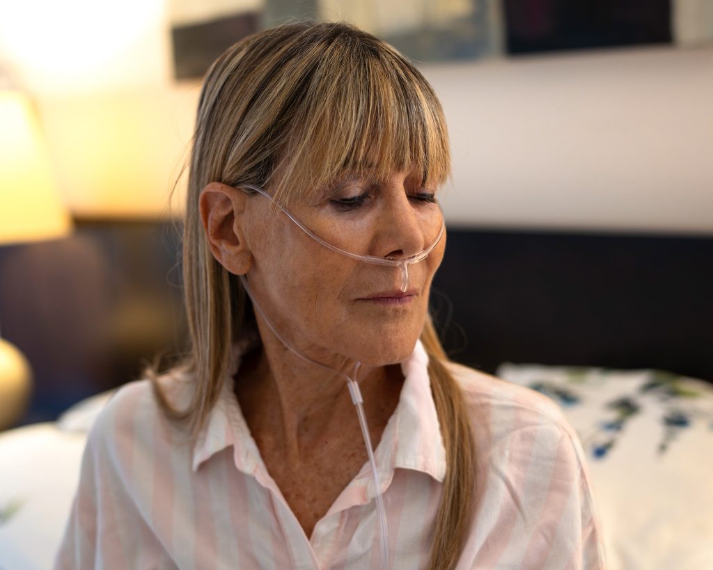 A patient wearing the Snap three-prong nasal cannula